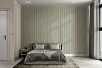 Vertical sage green stripes on neutral wallpaper

