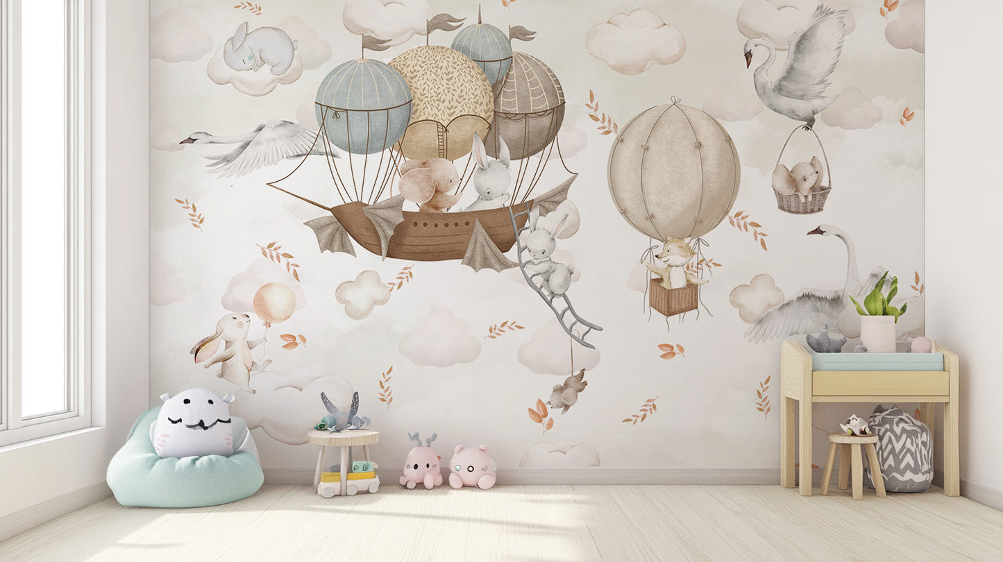 Cloud-Hopping Critters wallpaper mural of critters in balloons above a mint bean bag and play table in a nursery