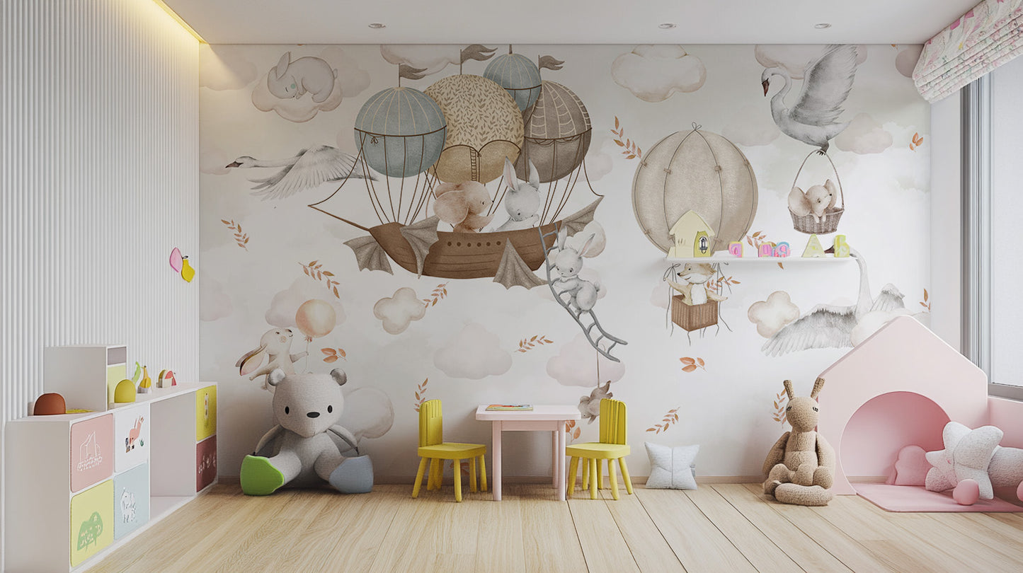 Cloud-Hopping Critters wallpaper mural in beige balloon clouds behind a teddy bear and yellow chairs in a playroom