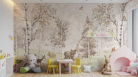 Magical Menagerie Woodland wallpaper mural in sepia birch trees behind a teddy bear and yellow chairs in a kids playroom