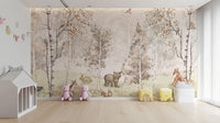 Magical Menagerie Woodland wallpaper mural with a bear cub and rabbits beside pink pig toys in a kids room