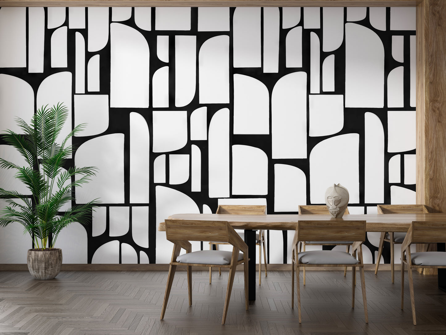 Monochrome Mosaic Tiles wallpaper mural in black and white behind a wood dining table in a bright dining room