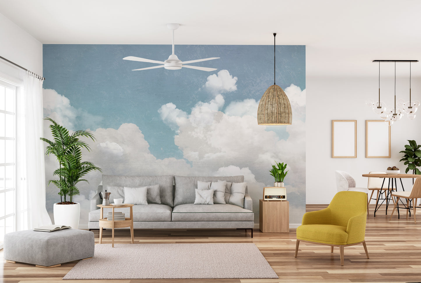 Calm and peaceful nursery room featuring cloud mural