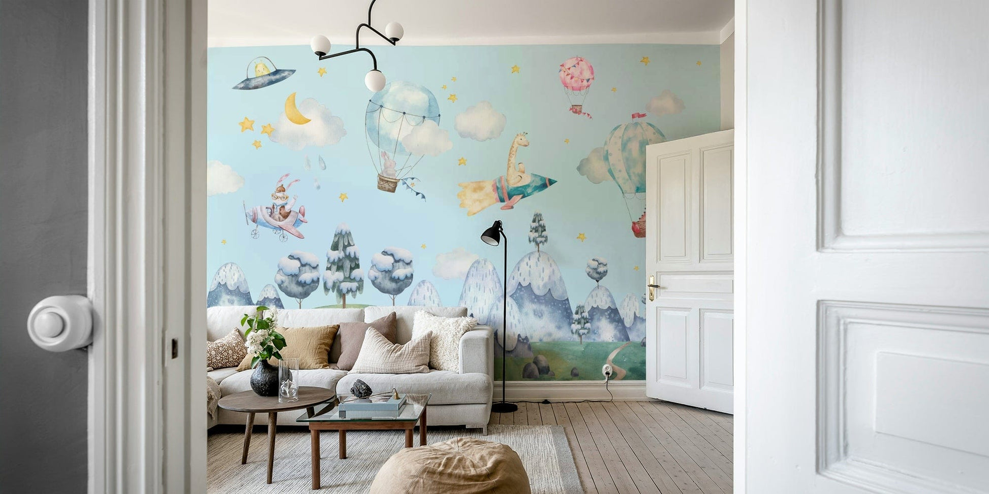 The design features hot air balloons and clouds.

