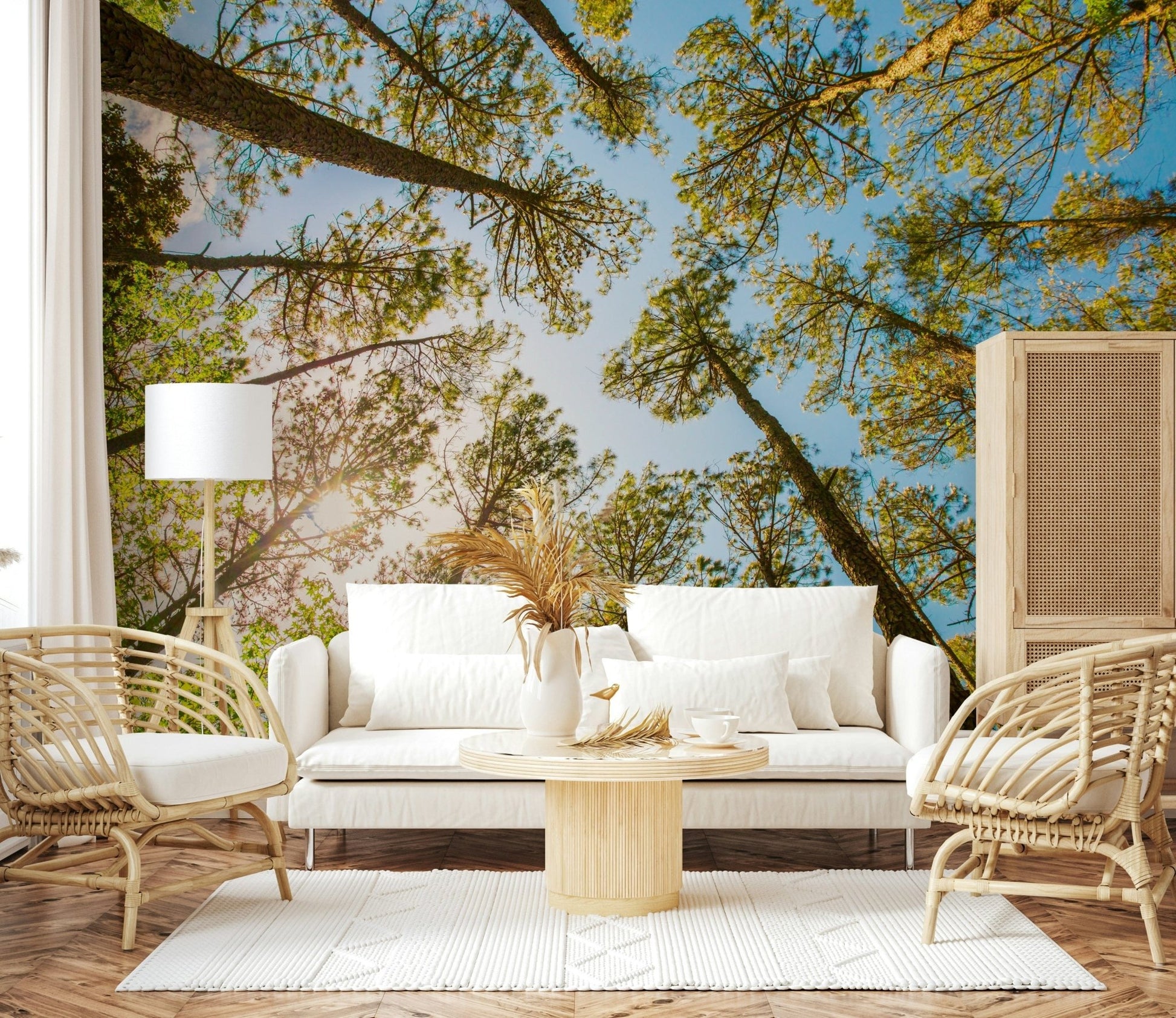 Tree tops wallpaper in reading nook, modern chair, calm green scene
