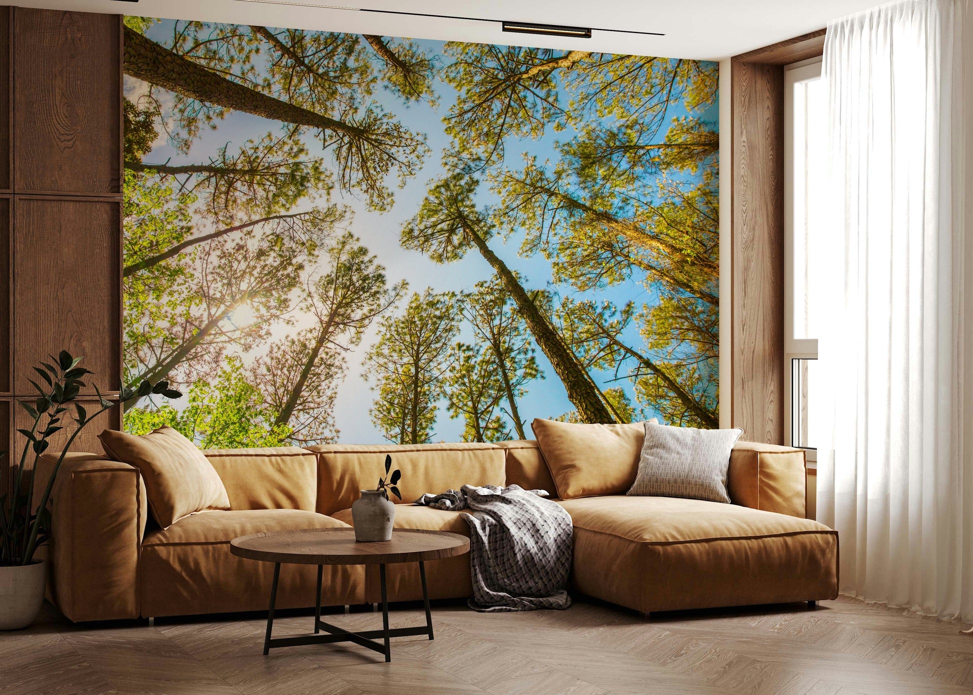 Green tree canopy mural in apartment lounge, minimalist furniture, feature wall