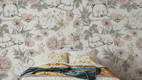 Sleeping Woodland wallpaper mural of bear cubs and bunnies in pink florals above a bed with yellow pillows