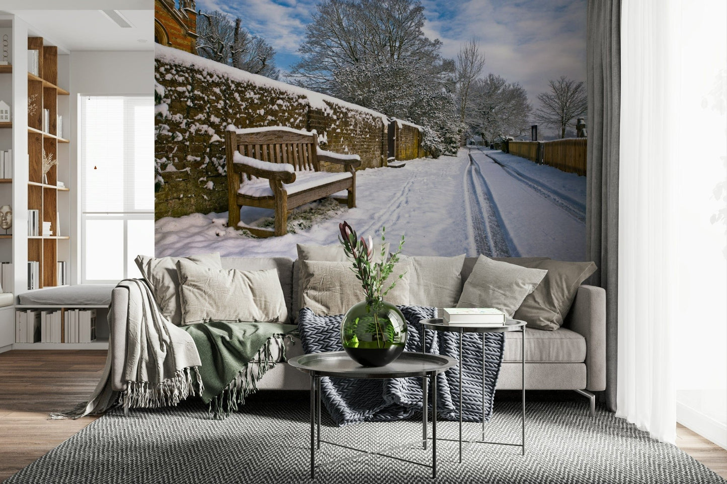 Snowy Bench Retreat Wallpaper Peaceful wooden bench beside a stone wall mural.