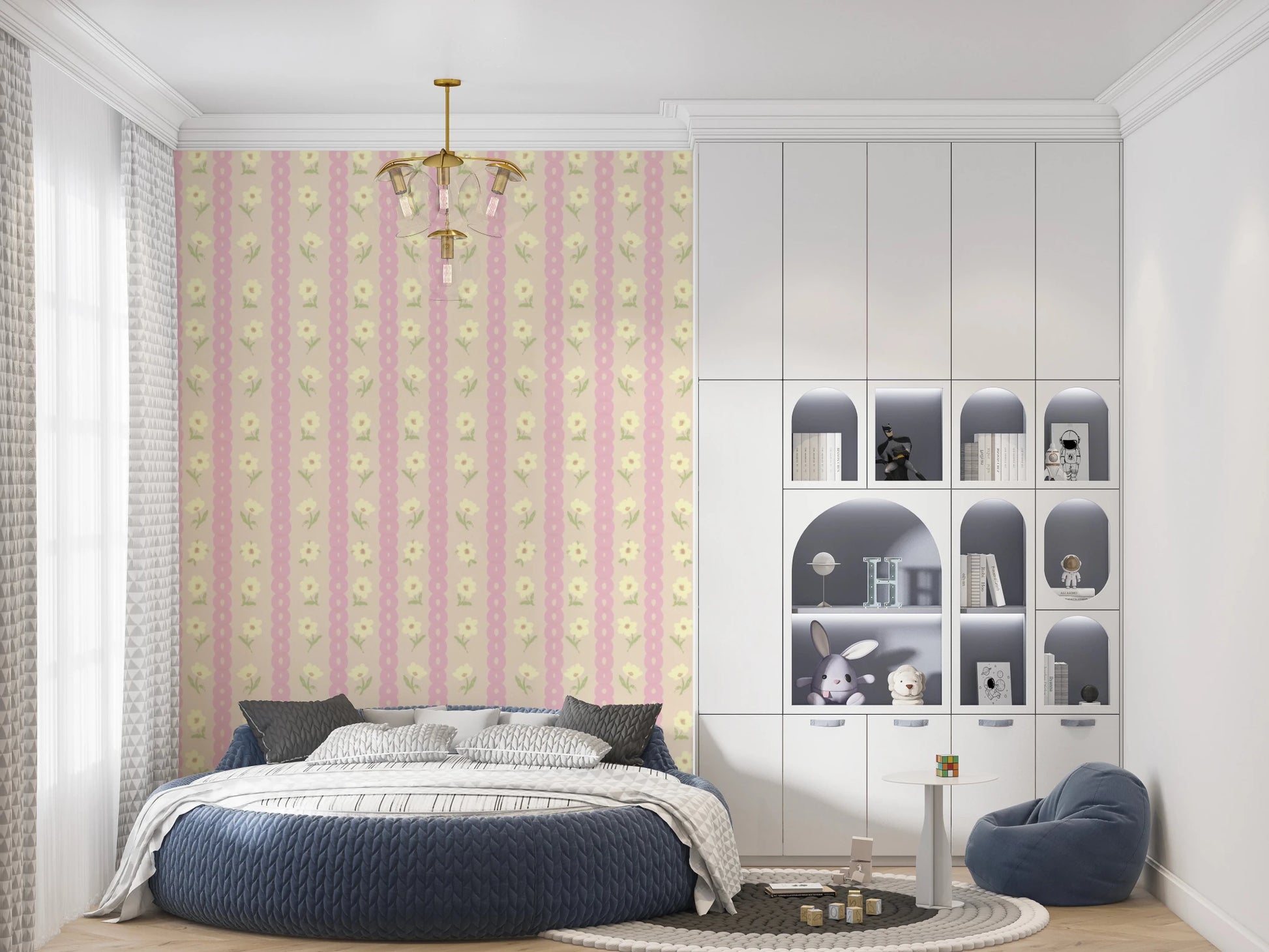 Soft Bloom Stripes wallpaper mural in a kids room with a round blue bed and white toy shelves, pink and cream