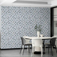 Gentle floating feathers wall mural in soft blue

