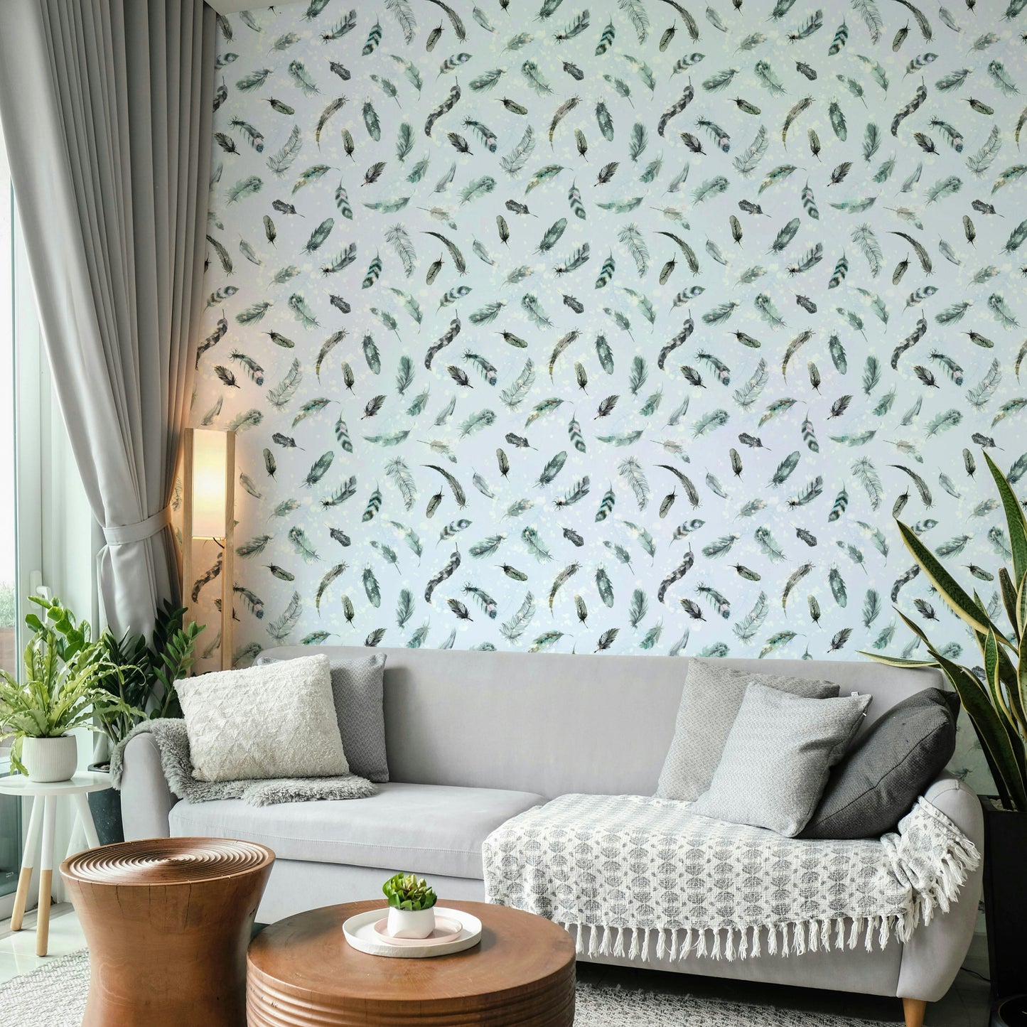 Delicate feather pattern wallpaper in blue hues

