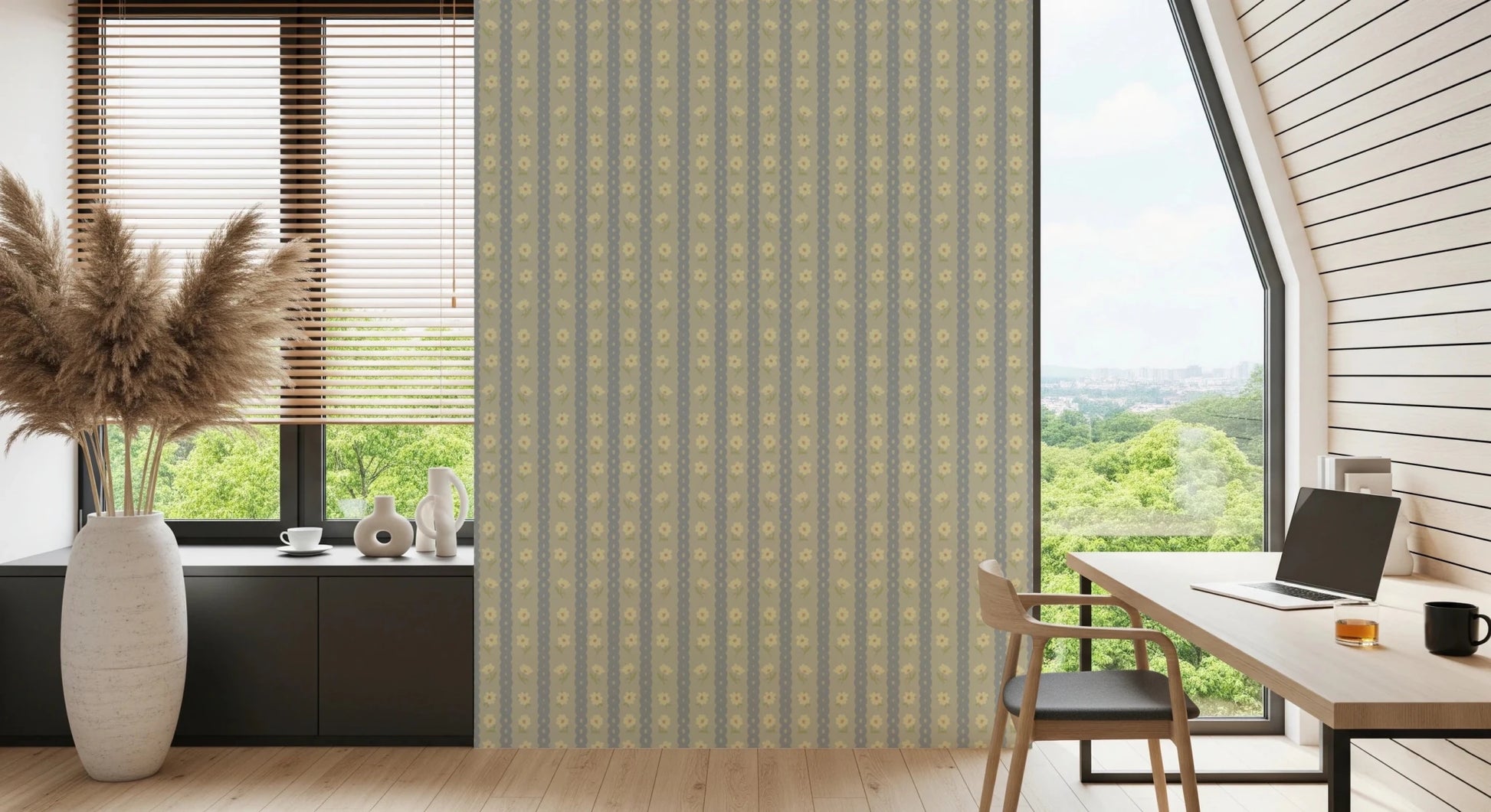 Soft Daisy Stripes wallpaper with sage and grey daisy stripes behind a wood desk and black chair in a bright home office
