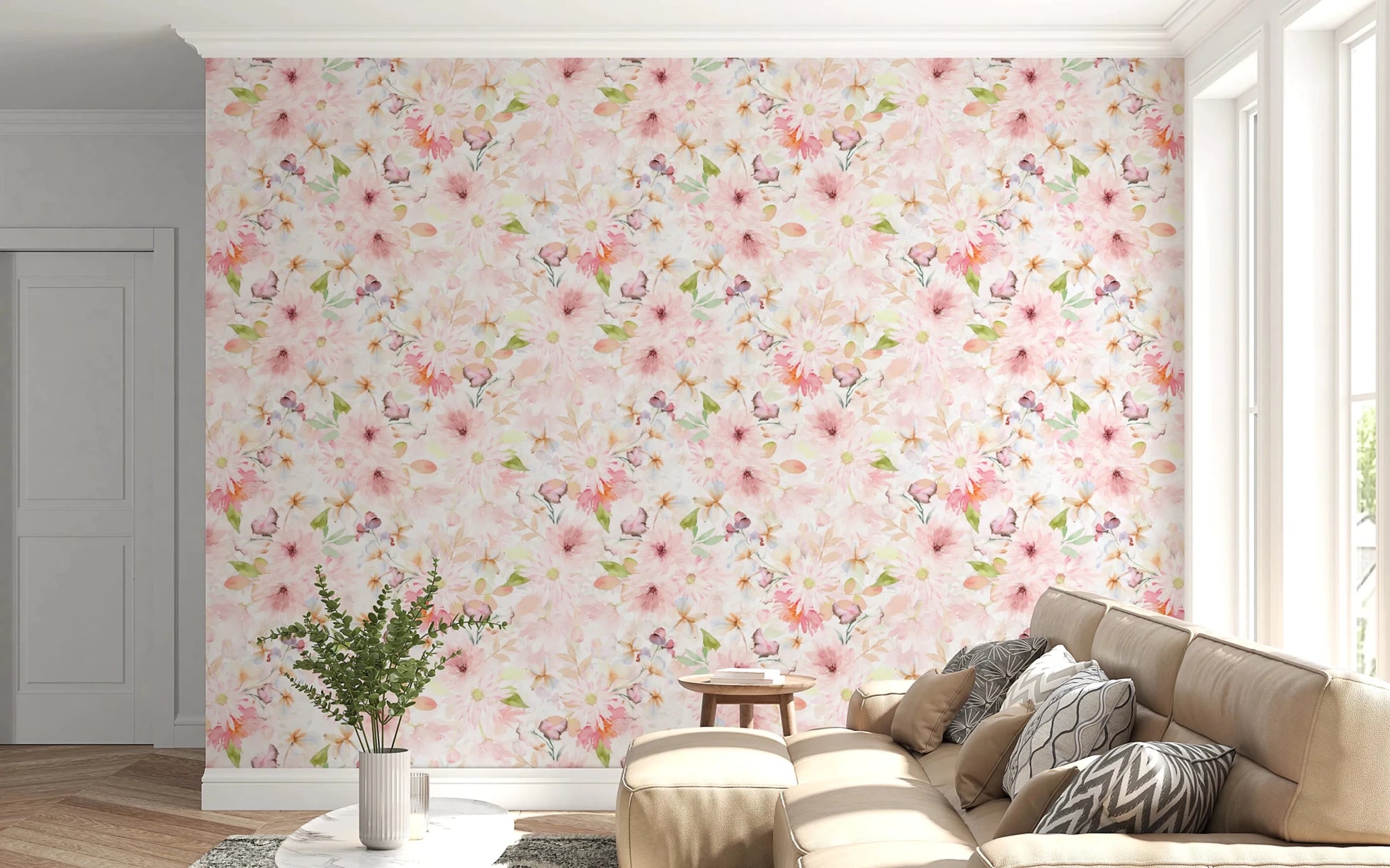Soft Floral Pink Meadow wallpaper mural of pink daisies behind a cream sofa with grey pillows and a fern in a living room