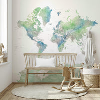 World map wallpaper in soft botanical green hues

