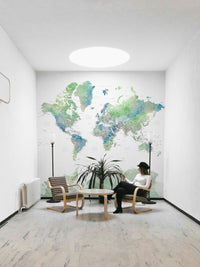Soft green watercolor world map wallpaper for walls

