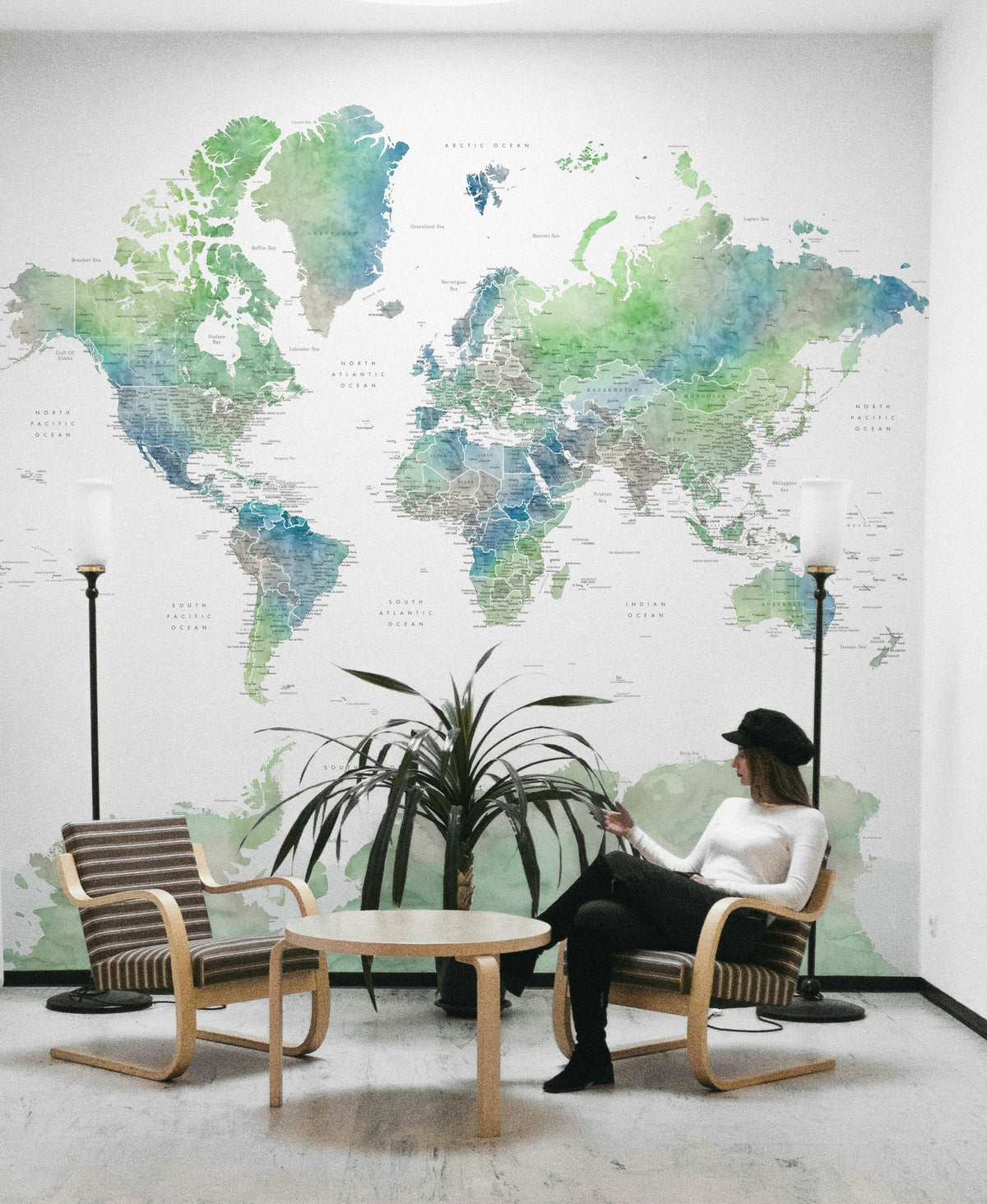 Soft green watercolor world map wallpaper for walls

