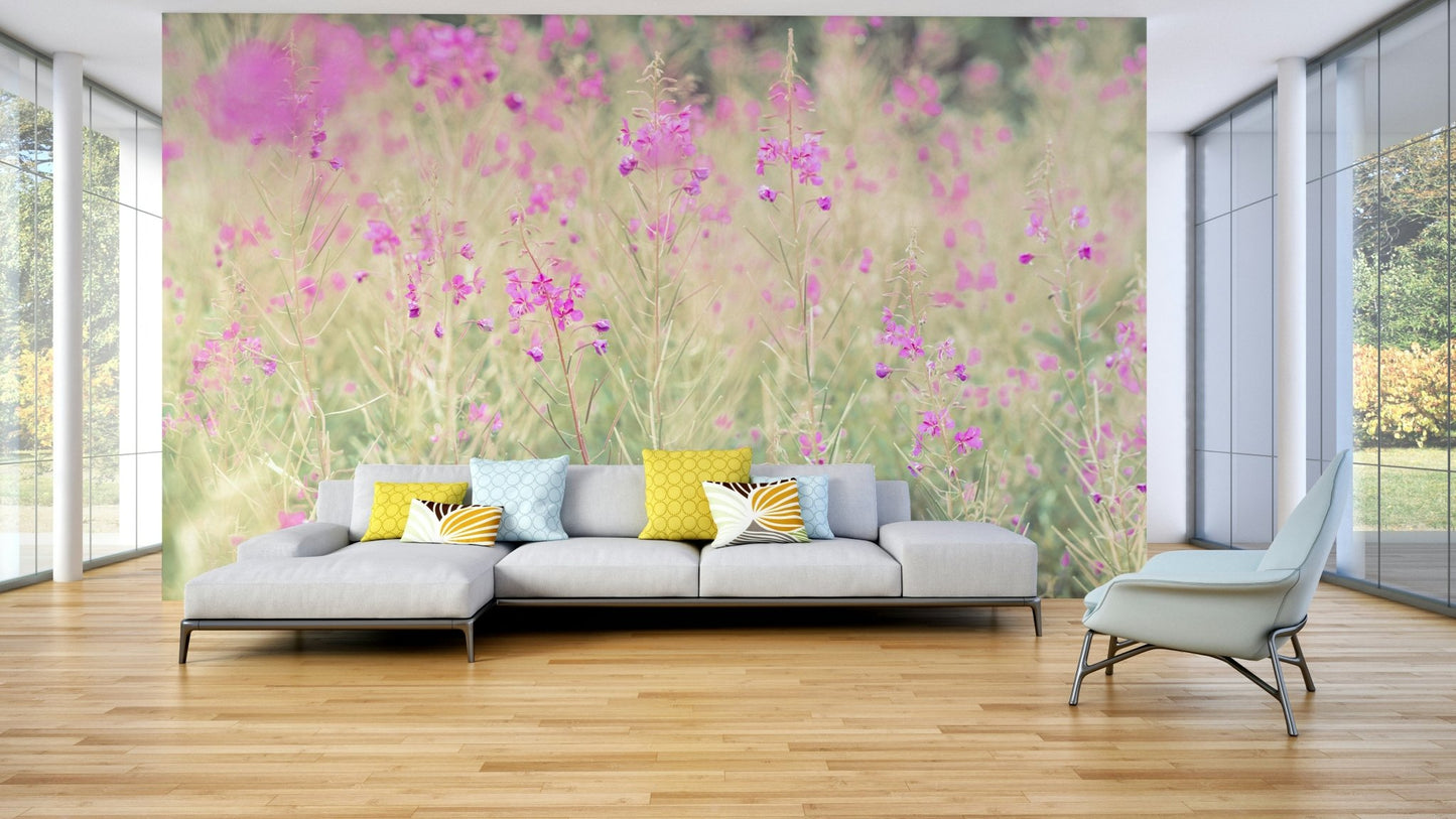 Calming countryside meadow mural with soft floral tones

