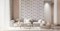 Soft Mosaic Tiles Blush Beige-GreyBlue wallpaper behind a beige low sofa with live-edge round tables