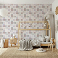 Soft Mosaic Tiles Blush Beige-GreyBlue wallpaper in a kids room with a wood house-frame bed and canopy