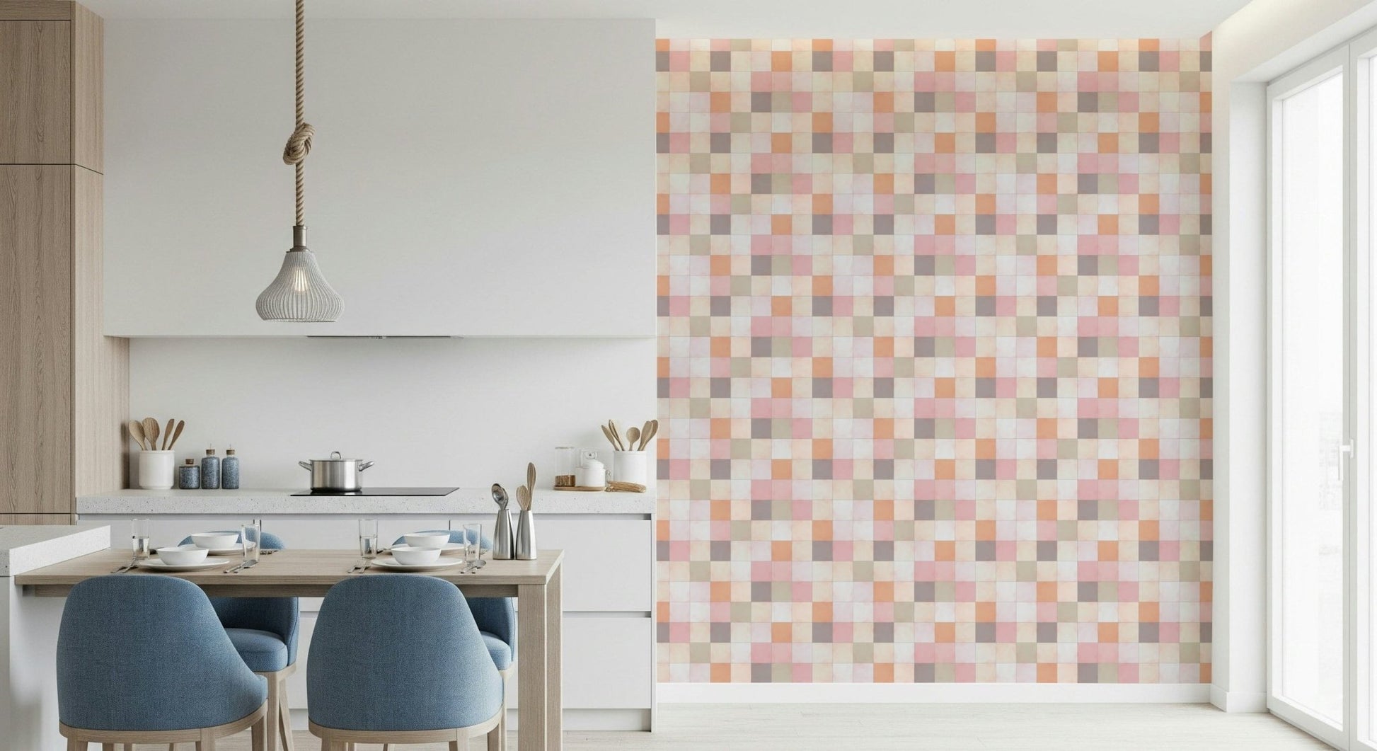 Soft Mosaic Tiles Peach Glow wallpaper beside a kitchen counter with blue chairs at a wood table