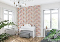 Soft Mosaic Tiles Peach Glow wallpaper behind a white upright piano in a bright window-lit living room