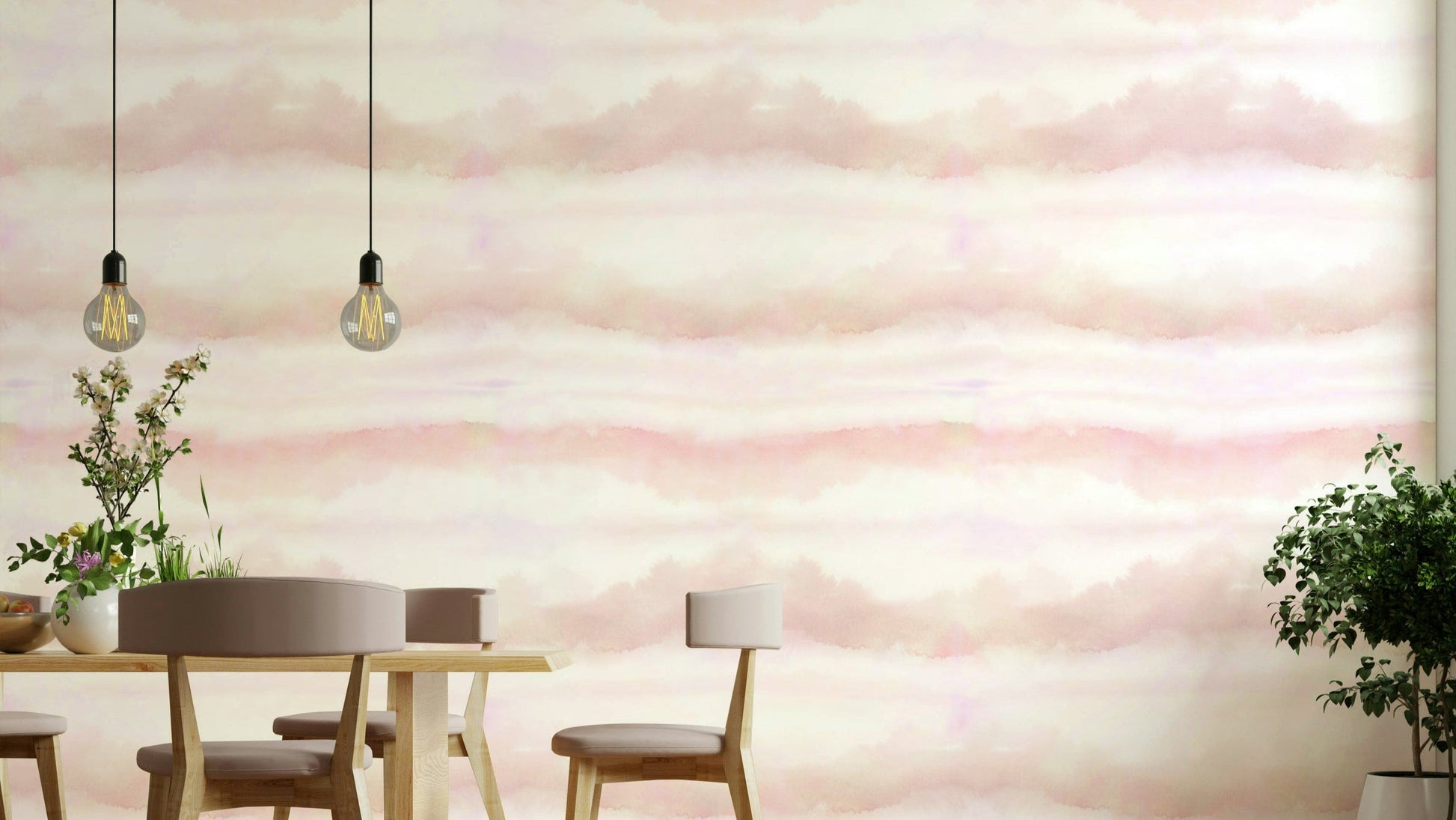 A bedroom decorated with pink sky wallpaper

