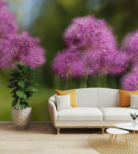 The background is a soft blend of greens and purples.

