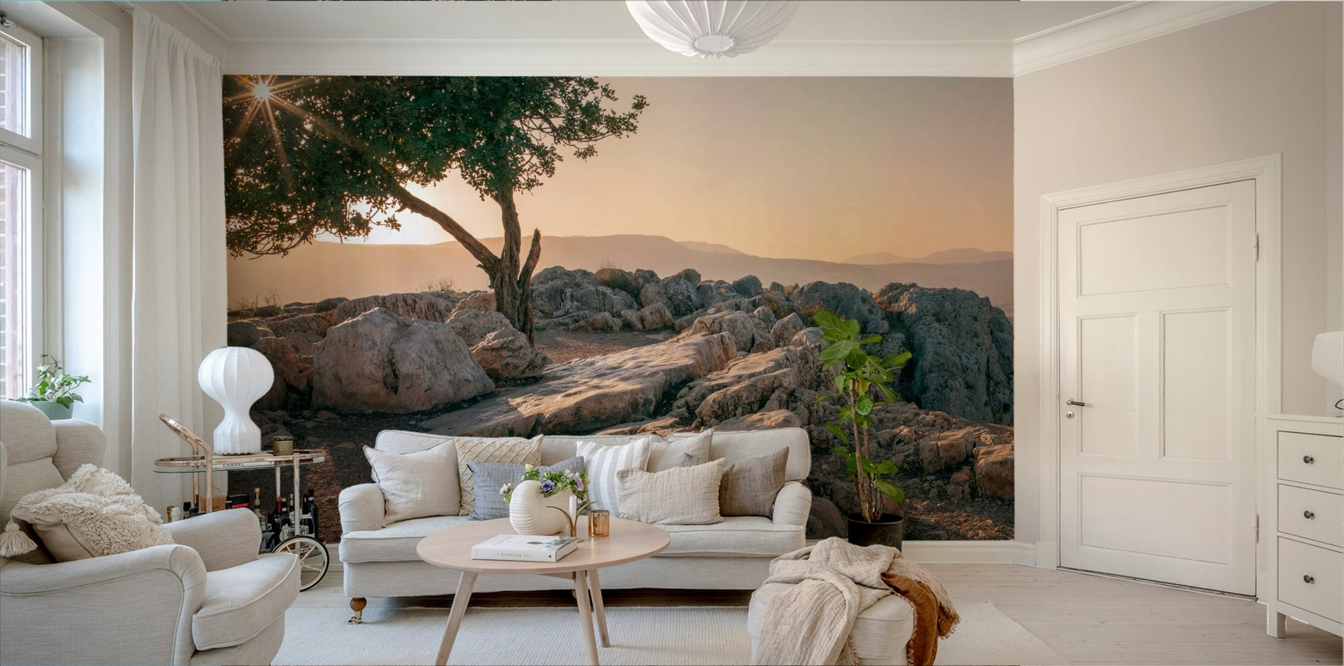 Peaceful solitary tree mural wallpaper with a sunset backdrop.

