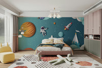 A peaceful wall mural with a whimsical, space-themed design.

