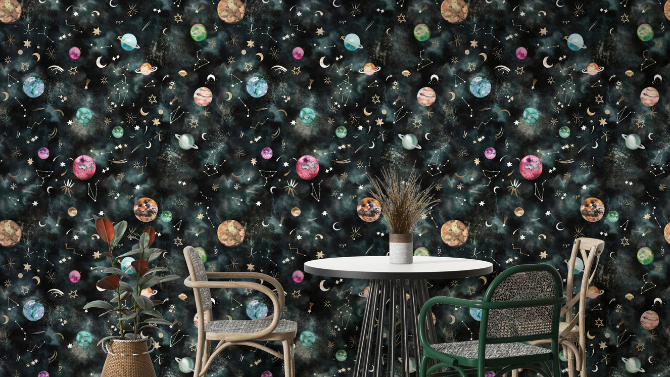 Space Galaxy Astronomy Constellations Planets Blue Wallpaper with swirling galaxies and stars.

