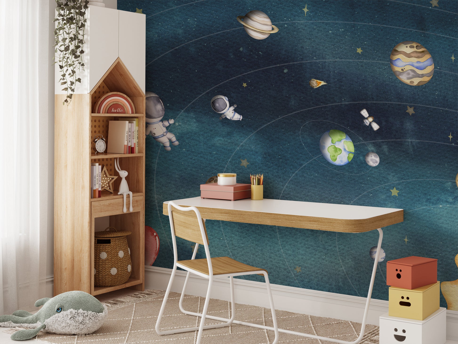 Self adhesive space joy dark wall mural in a child's workspace with a wooden desk and a tall house-shaped shelving unit.