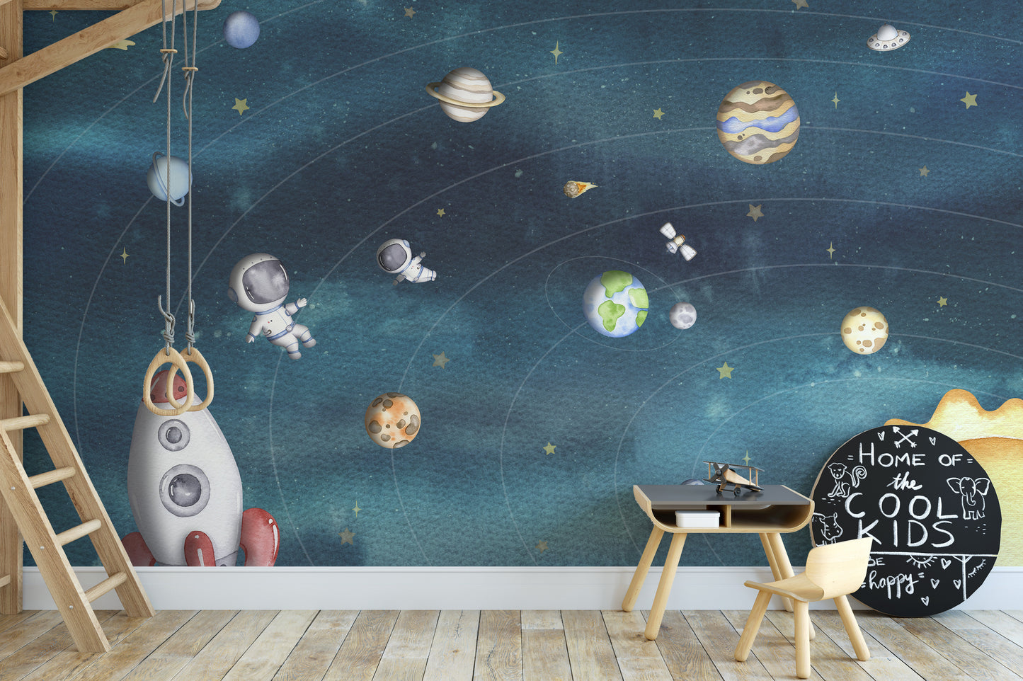 Standard space joy dark wall mural for a kids' study area with a small desk and a fun rocket-shaped wall element.