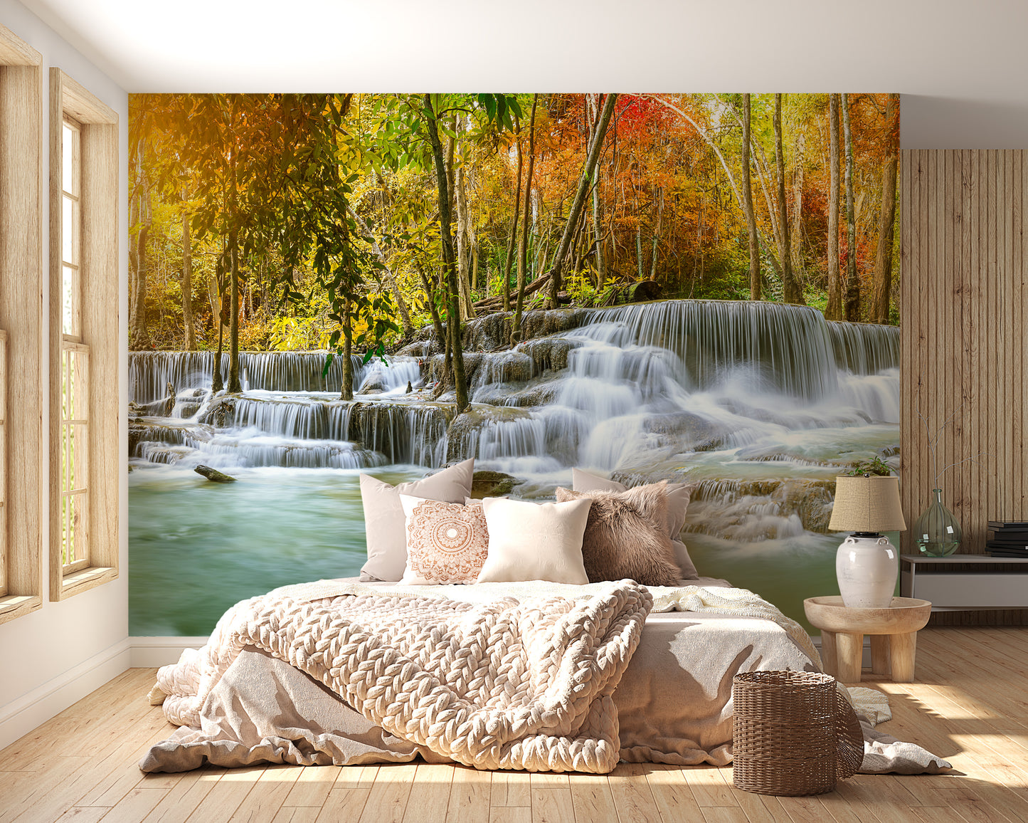 Natural Sparkling Waterfall Jungle wallpaper mural styled as a living room feature wall behind a sofa and seating