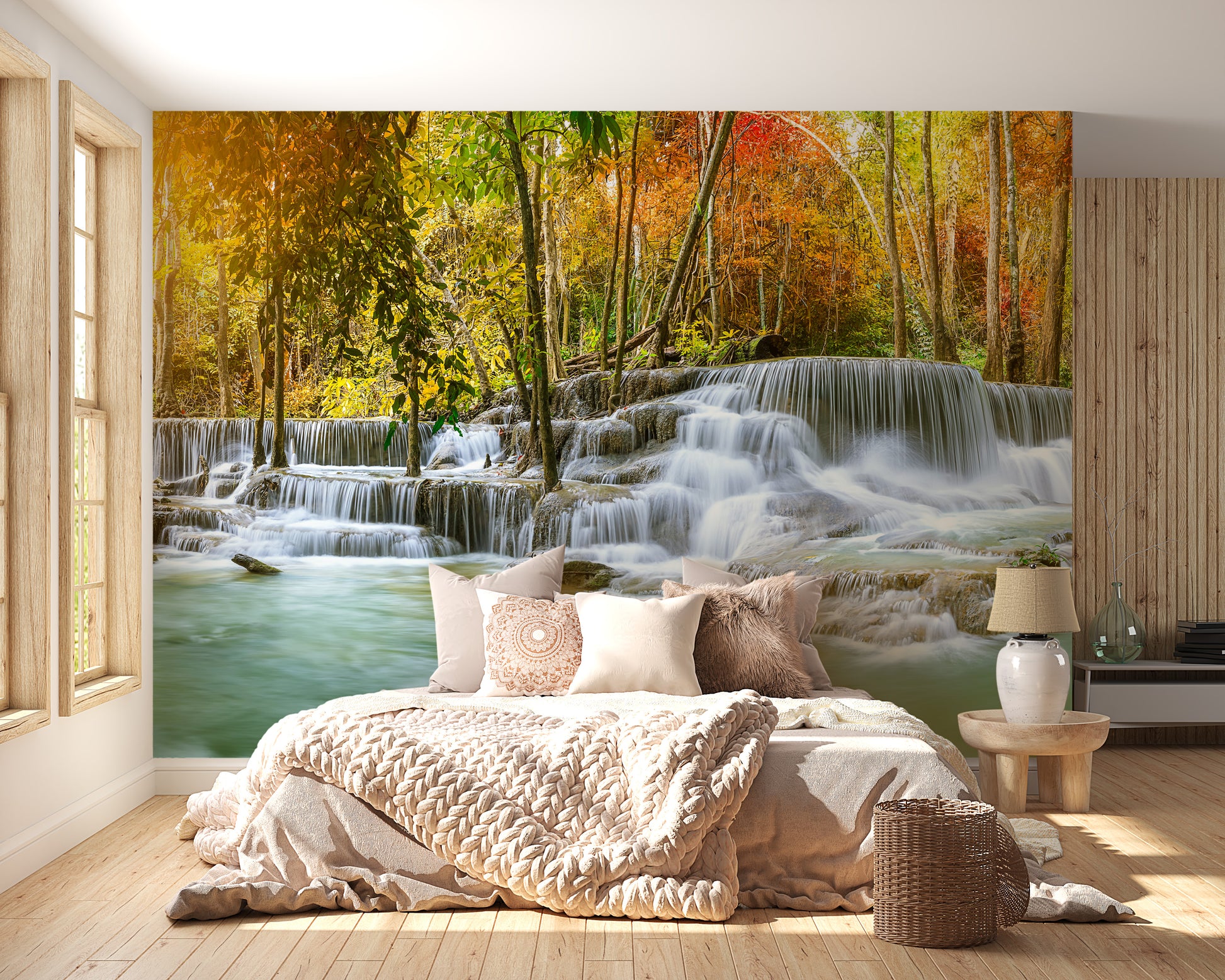 Natural Sparkling Waterfall Jungle wallpaper mural styled as a living room feature wall behind a sofa and seating