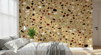 An artistic contemporary speckled mural on minimalist wallpaper.