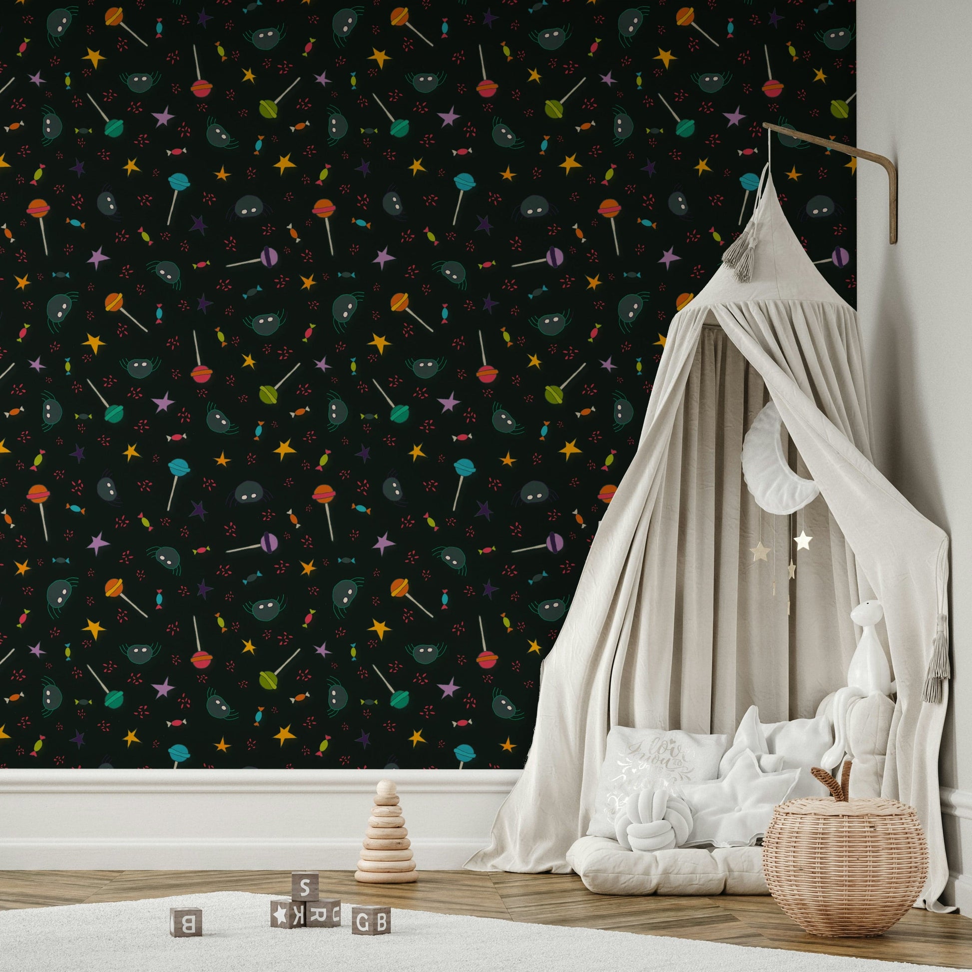 The design includes various festive motifs like planets, stars, and candy.
