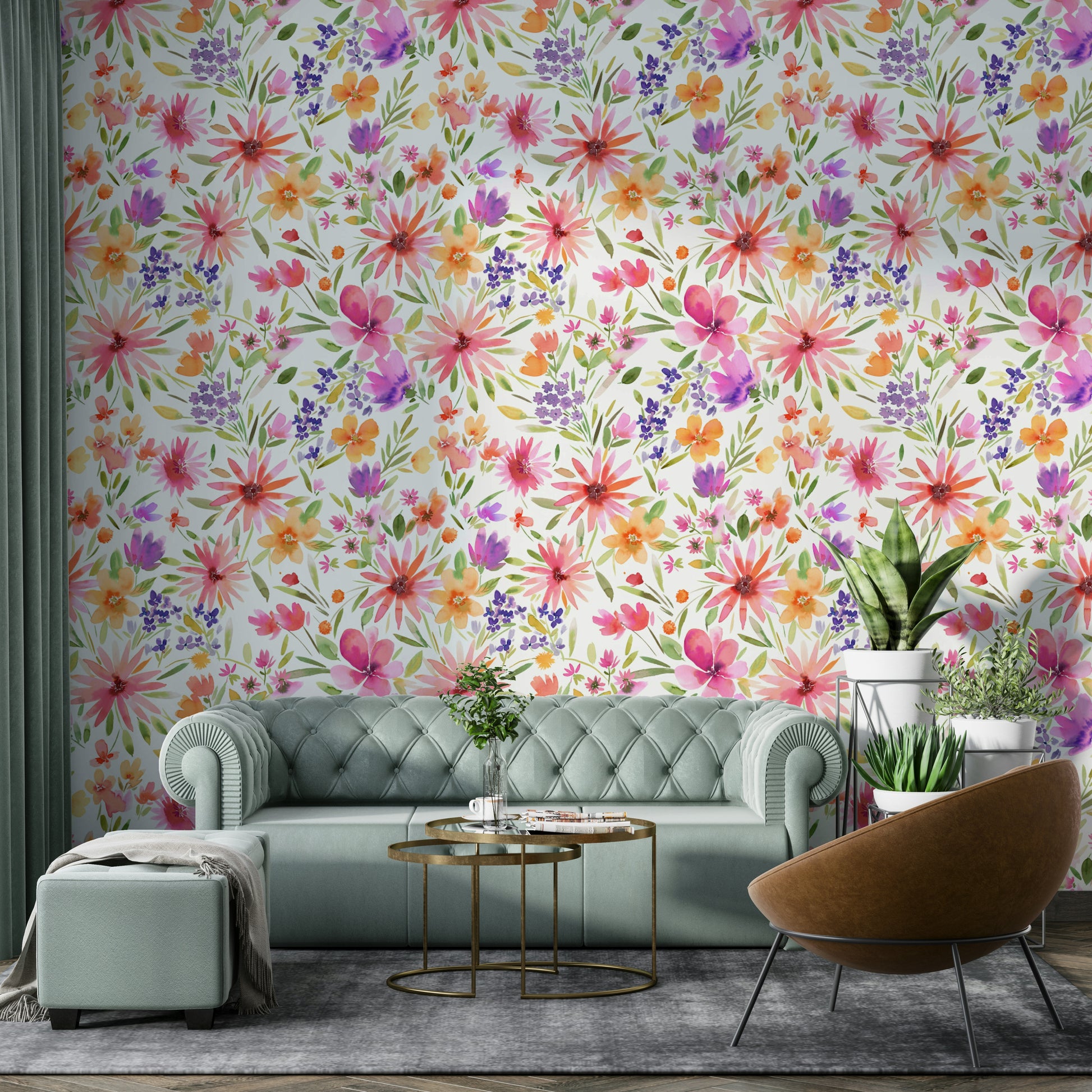 Close-up of colorful dahlias surrounded by soft green foliage and whimsical patterns.

