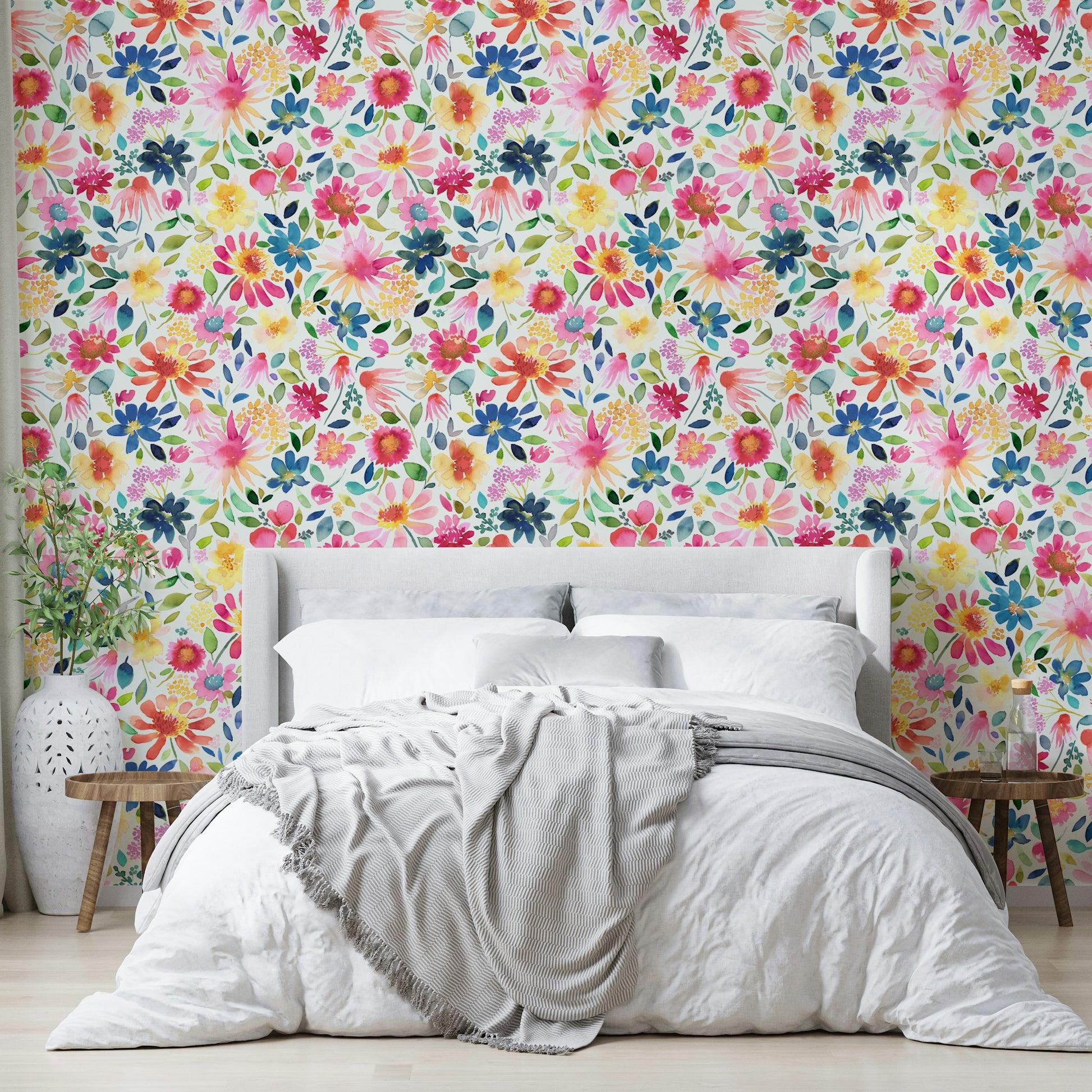 Wallpaper with zinnias in full bloom, surrounded by soft green foliage.

