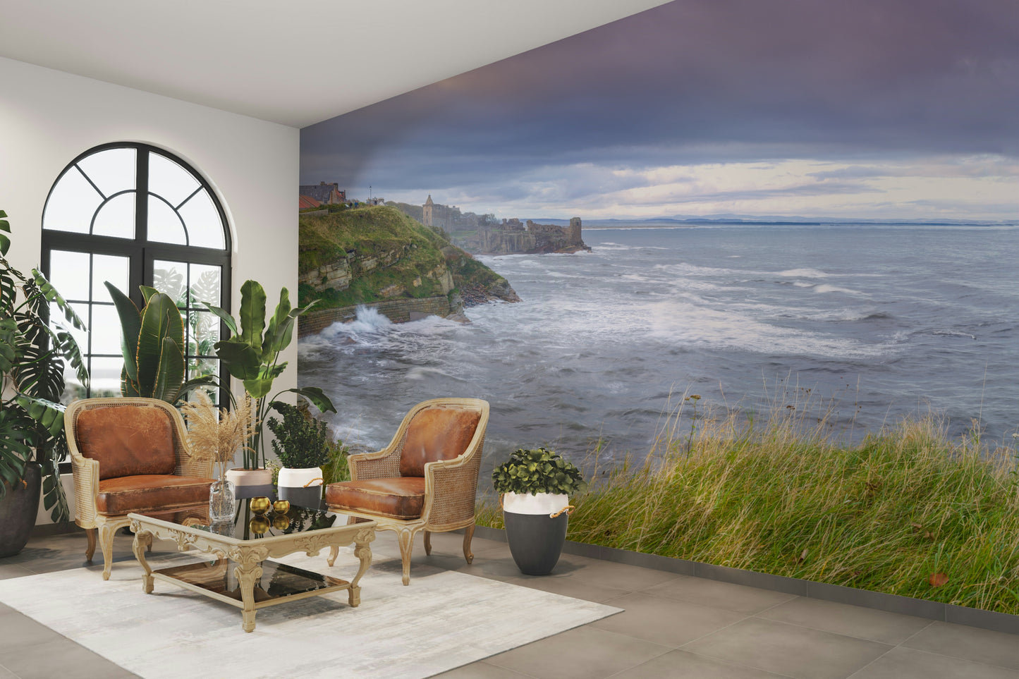 The mural shows a peaceful shoreline with ancient ruins.

