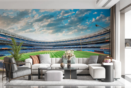 Stadium View wallpaper mural of a baseball stadium and cloudy sky above a white sectional in a living room