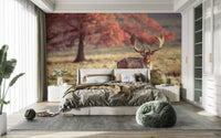 Nature-inspired mural with a stag in a scenic field

