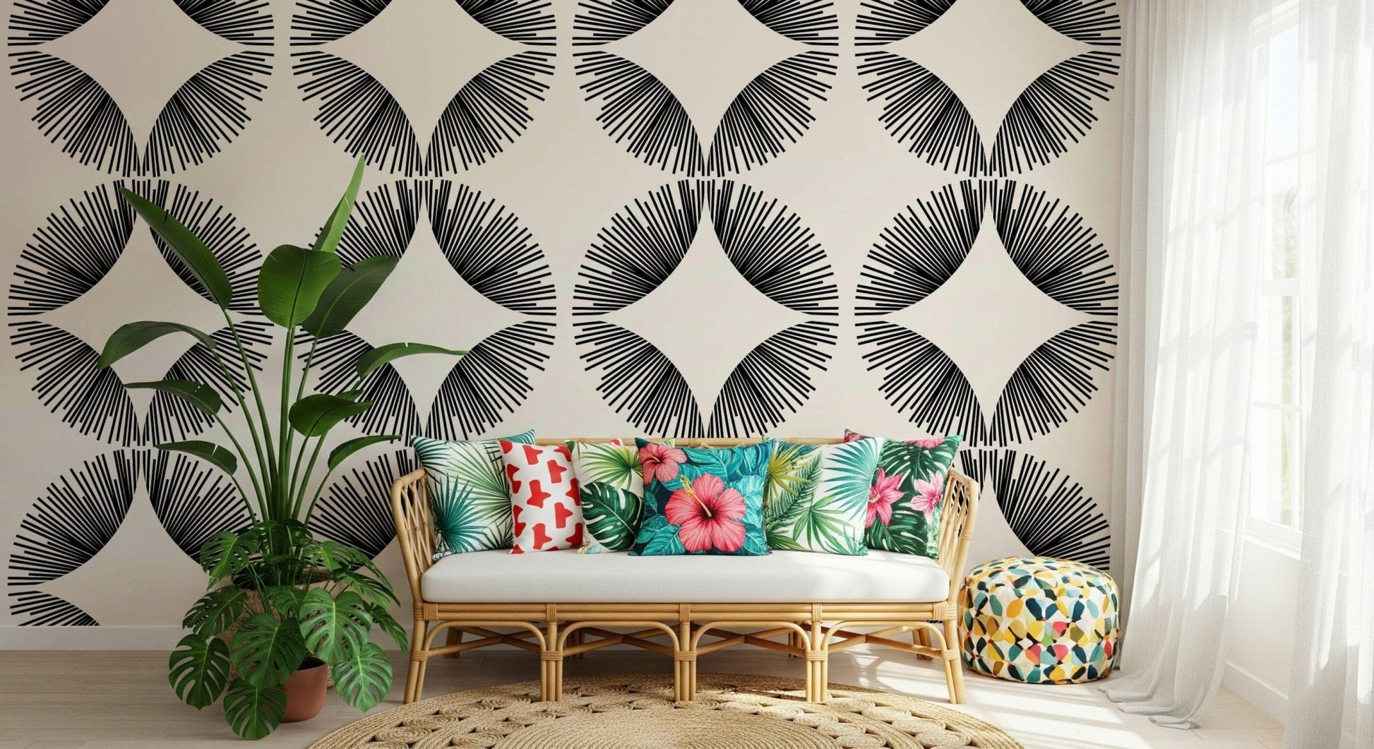 Starburst Deco wallpaper of black starbursts on cream behind a rattan bench with tropical floral cushions