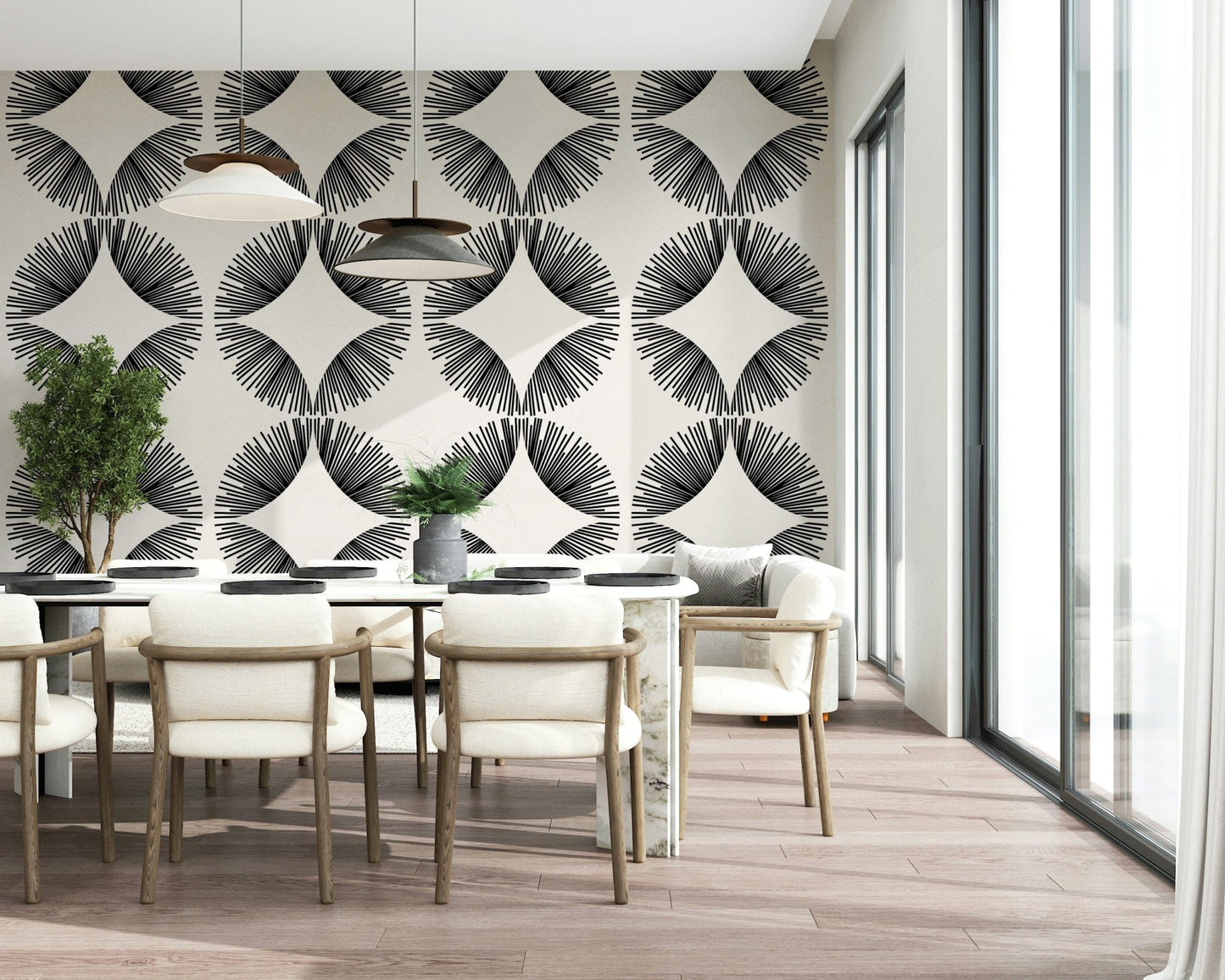 Starburst Deco wallpaper of black starbursts on cream behind a marble dining table with cream chairs