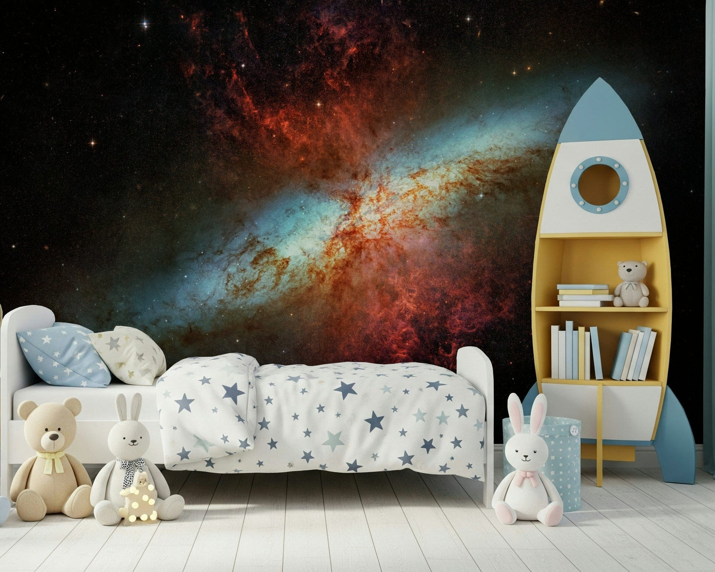 Stardust Symphony wallpaper mural showing a bright nebula in a kids room with a yellow rocket bookshelf and teddy