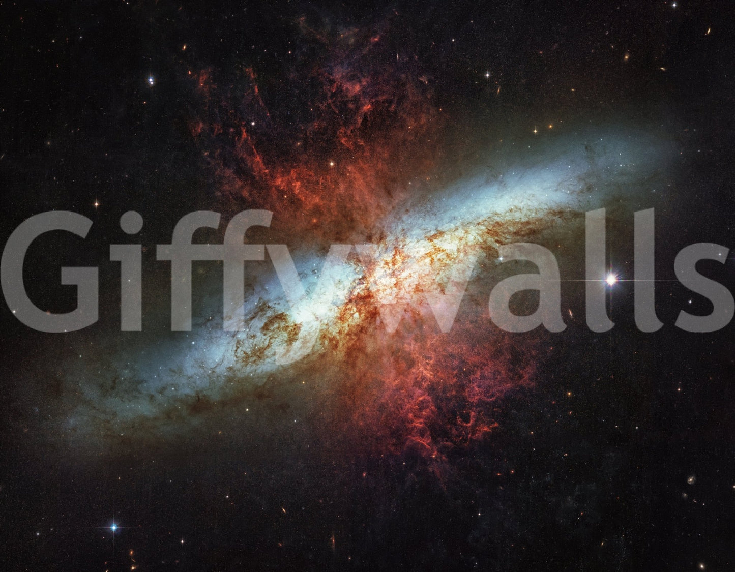 Stardust Symphony wallpaper mural close-up showing the red and turquoise nebula pattern against deep starry space