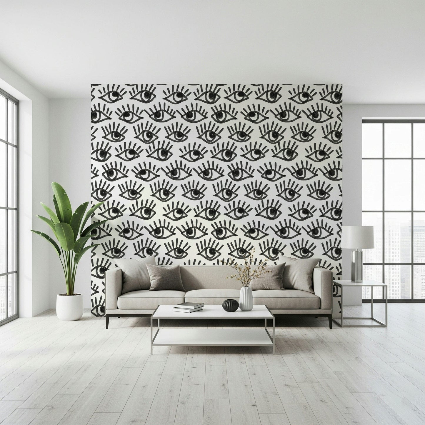 Wall mural depicting abstract staring eyes in shades of gray and black.