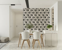 Abstract wallpaper showcasing multiple monochrome eyes in a striking pattern.