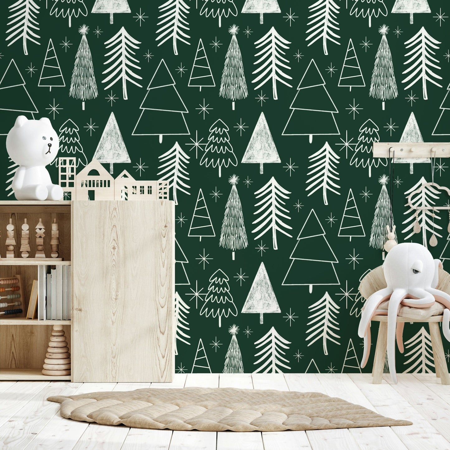 A cozy festive wallpaper filled with white line-art trees over a rich green background.