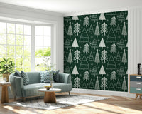 Hand-drawn Christmas trees in varied shapes and sizes forming a playful winter wallpaper.