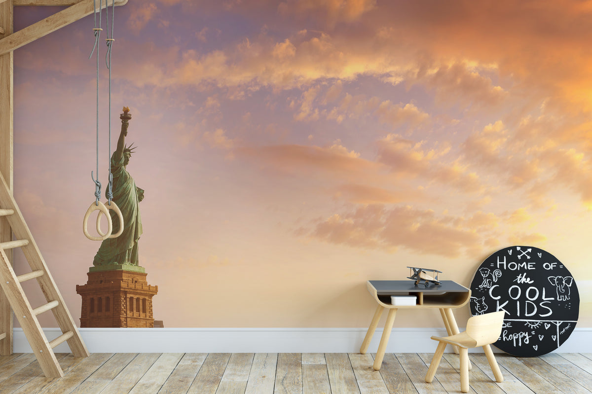 Statue of Liberty wallpaper with sunset sky behind a wooden kids table and cool kids chalkboard sign